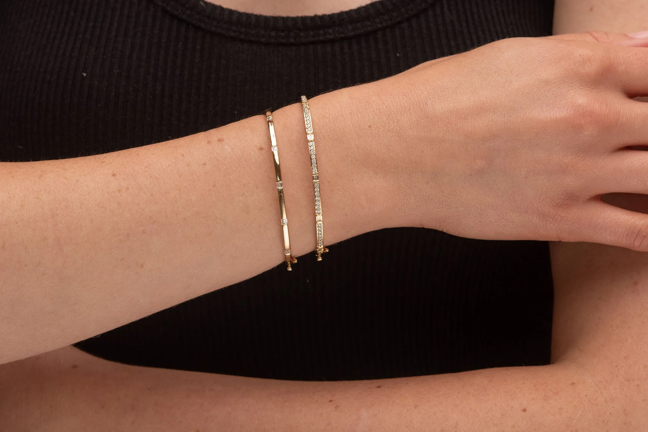 Gold Bangle with diamond baguettes stations