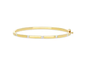 Gold Bangle with diamond baguettes stations